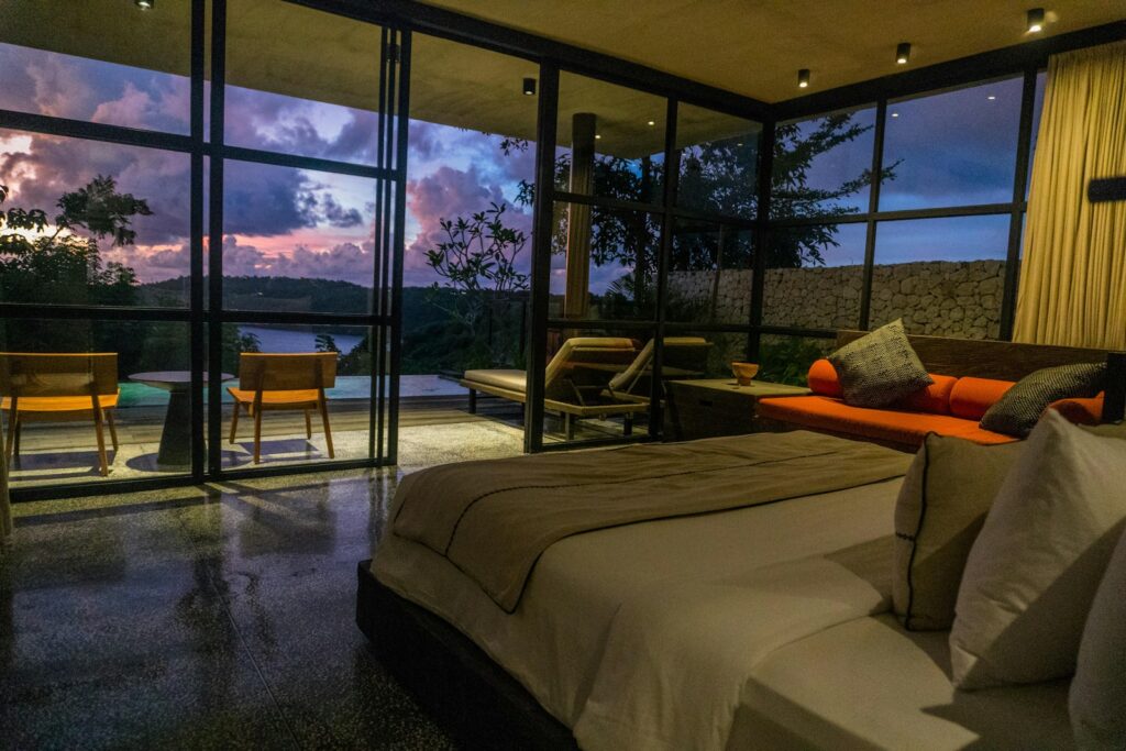 Best hotels in Cairns, A bedroom with a large bed sitting next to a window