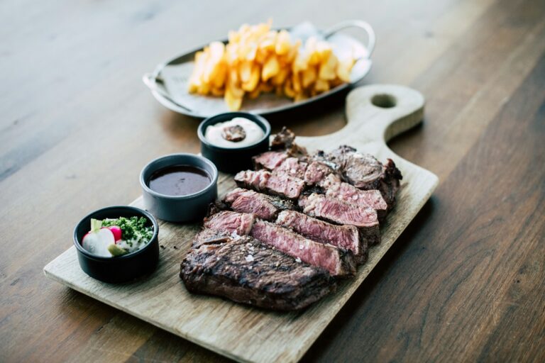 Cairns Queensland Australia, waterfront dining in cairns, sliced meat on white ceramic plate